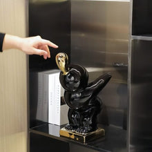 Load image into Gallery viewer, Luxury Black & Gold Adventure Boy Ceramic Sculpture – Modern Tabletop Décor Accent