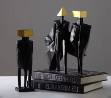 Load image into Gallery viewer, Luxury Black &amp; Gold Geometric Couple Sculpture – Modern Abstract Figurine Set
