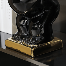 Load image into Gallery viewer, Luxury Black &amp; Gold Adventure Boy Ceramic Sculpture – Modern Tabletop Décor Accent
